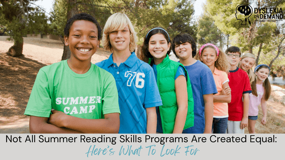 A diverse group of smiling children stand in a line outdoors, with trees in the background. The text reads: Not All Summer Reading Skills Programs Are Created Equal: Here’s What To Look For. The Dyslexia On Demand logo is in the top right corner.